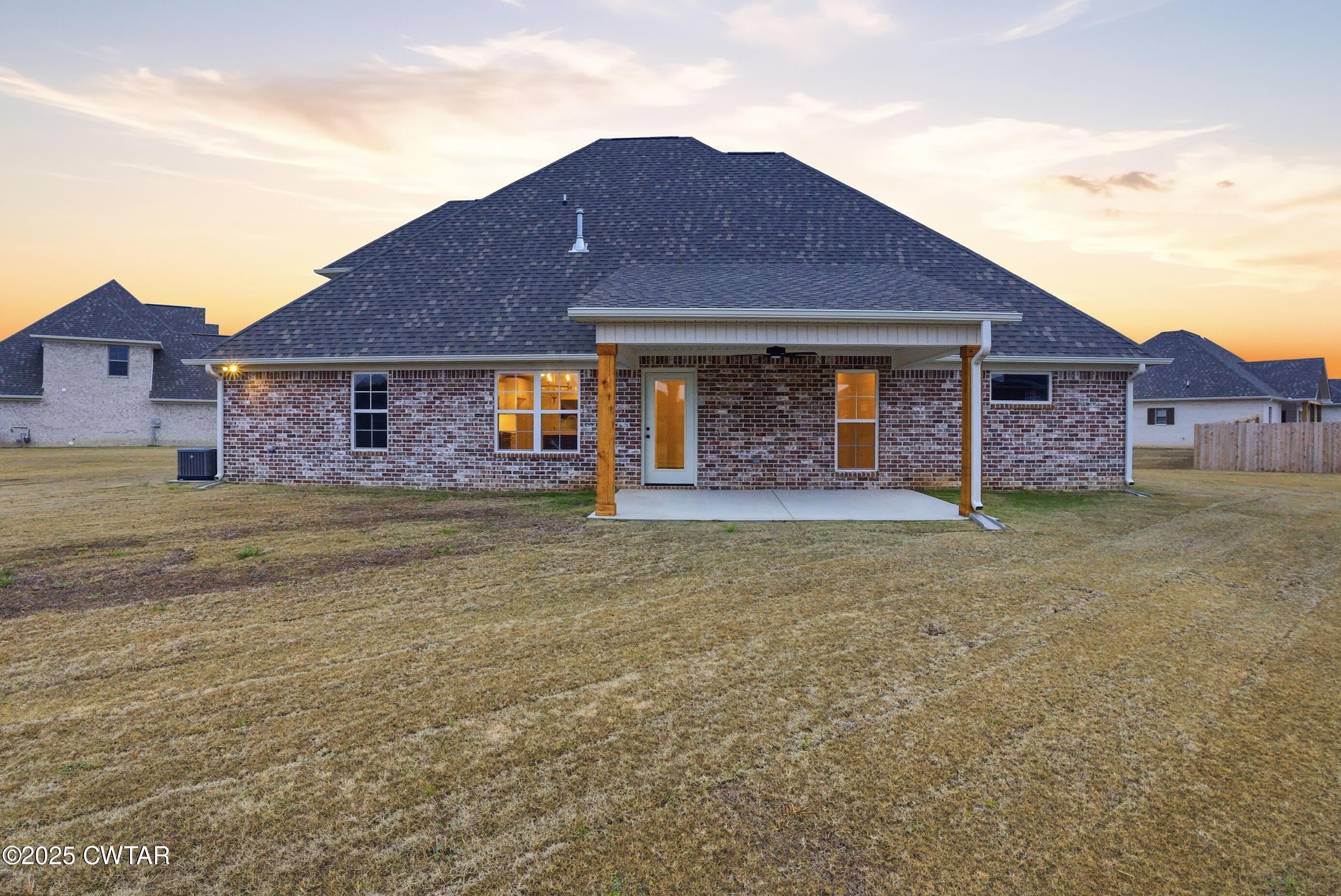 164 Daybreak Loop Medina, TN 38355 - Photo 39 of 40 a front view of a house with garden