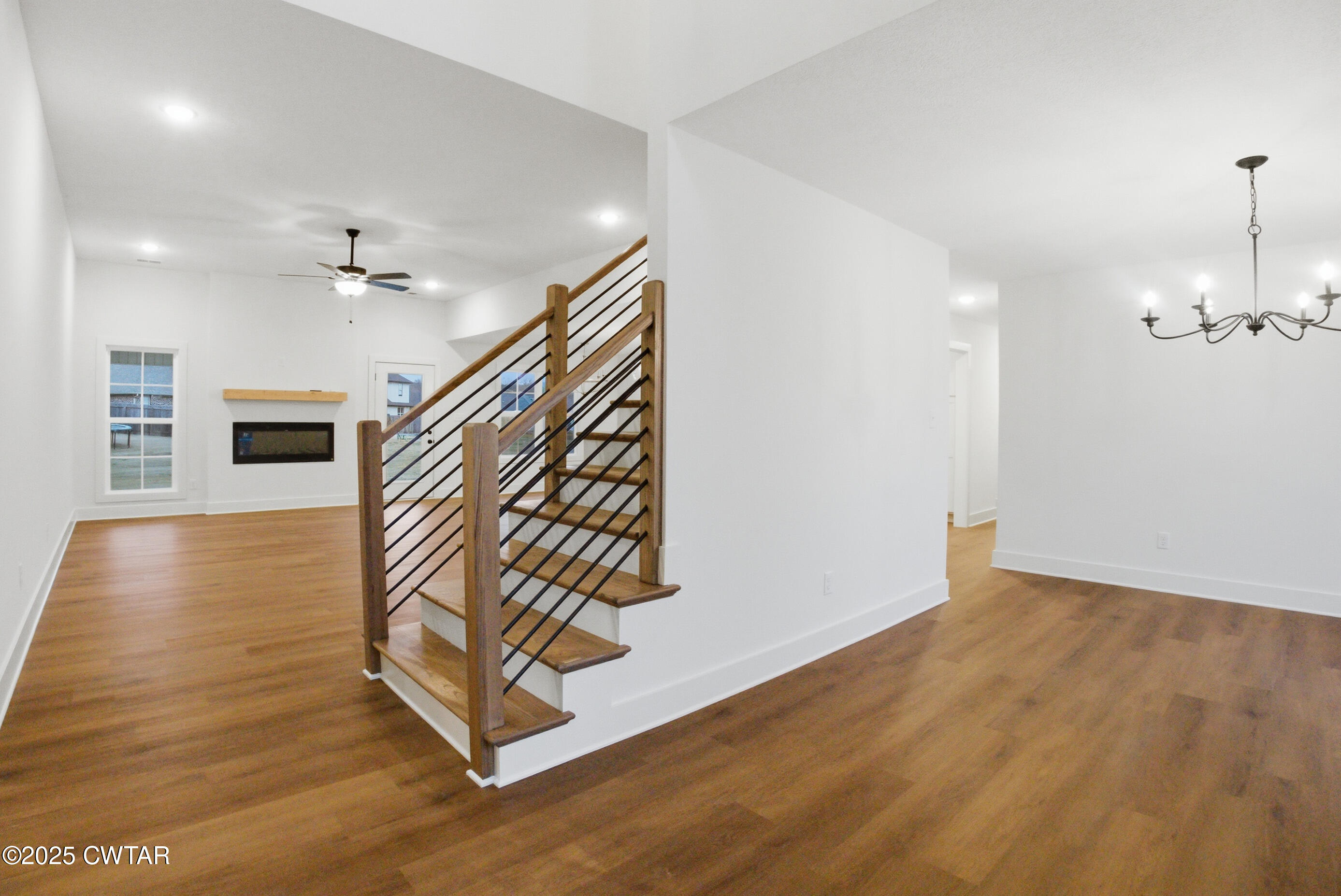 164 Daybreak Loop Medina, TN 38355 - Photo 4 of 40 a view of entryway and hall with wooden floor
