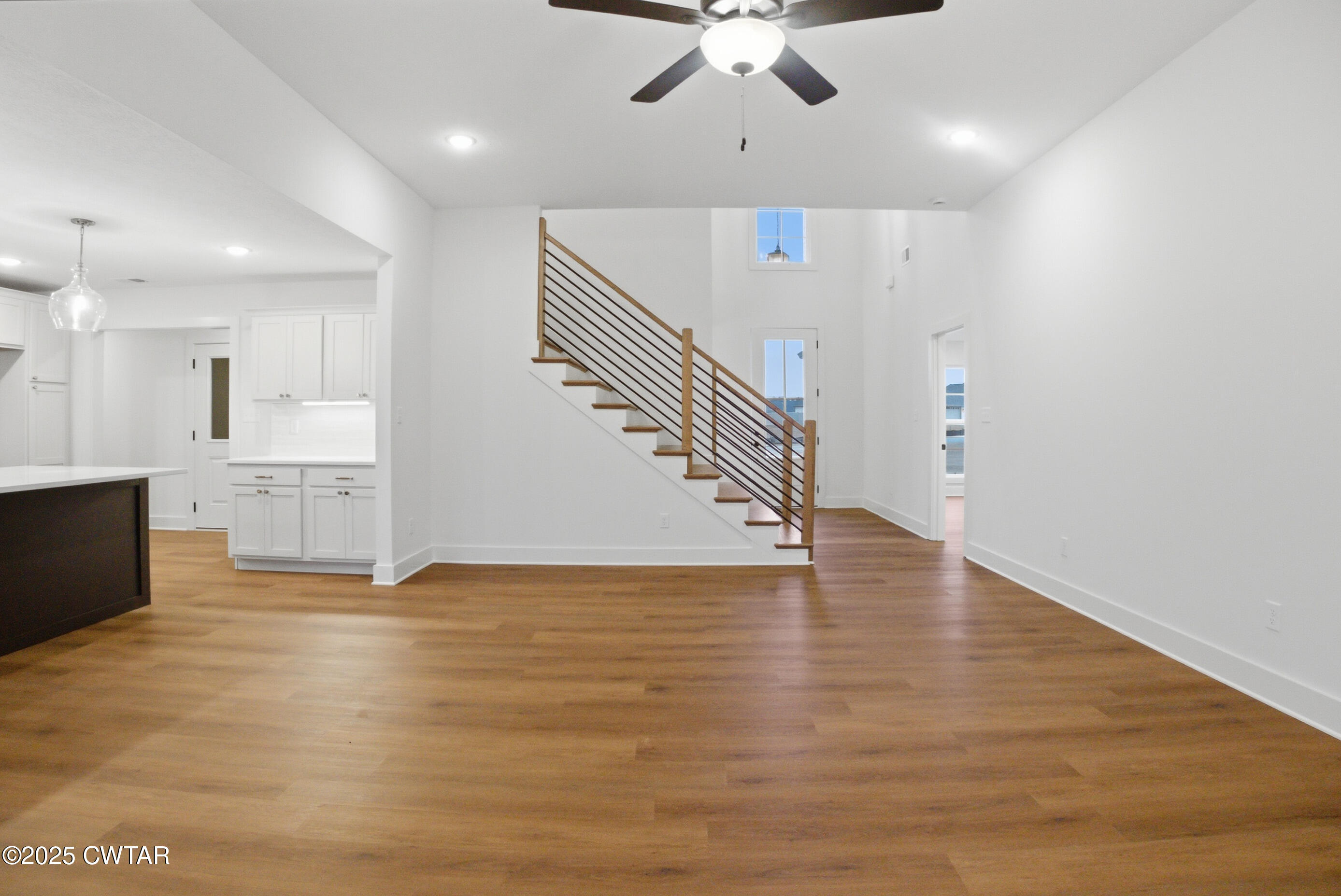 164 Daybreak Loop Medina, TN 38355 - Photo 7 of 40 a view of empty room with wooden floor