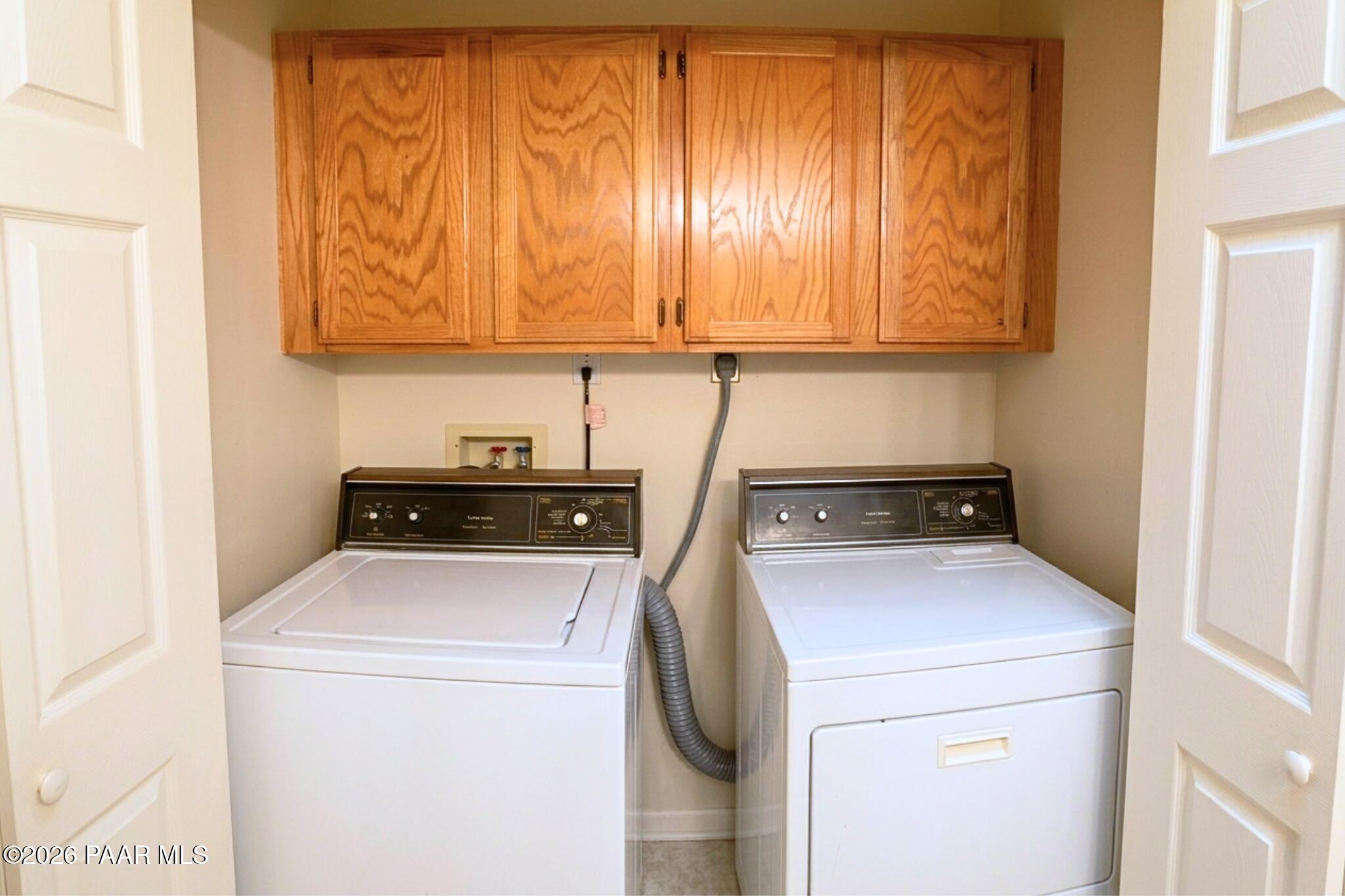 908 Rolling Green Road Dewey, AZ 86327 - Photo 8 of 13 a utility room with dryer and washer