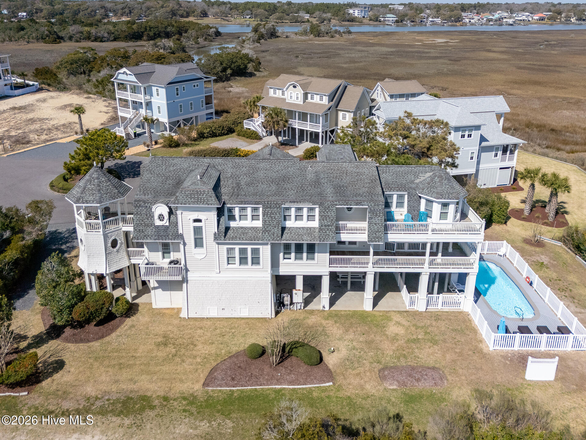 1032 Tide Ridge Drive Holden Beach, NC 28462 - Photo 1 of 75 DJI_20260314155022_0016_D-HDR