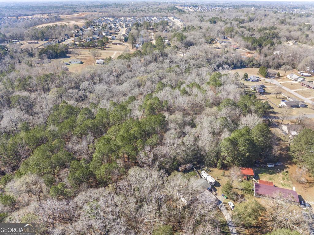42.5 Old Perry Road Bonaire, GA 31005 - Photo 9 of 17 a view of a houses with a yard