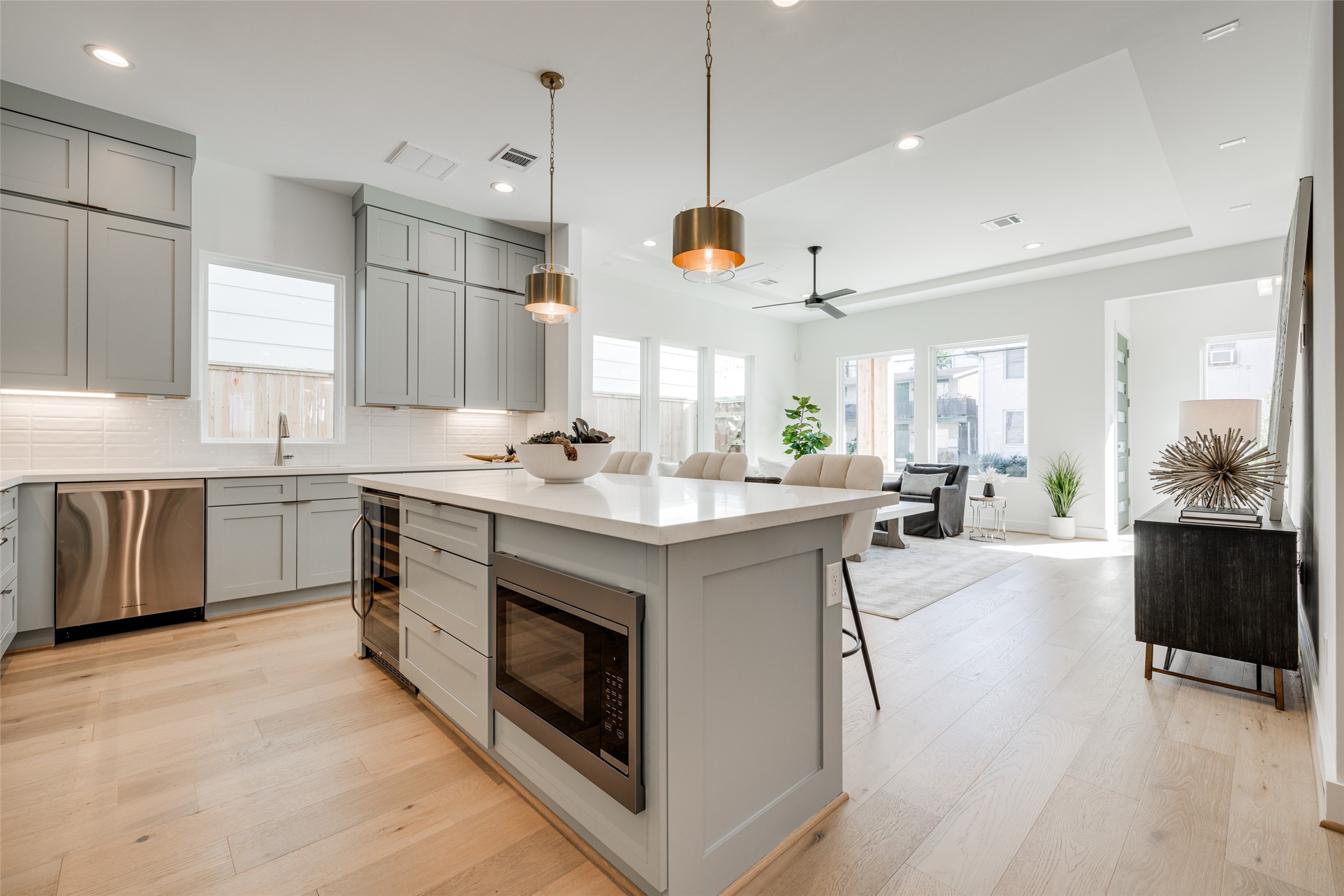 2015 Hopkins Street Houston, TX 77006 - Photo 24 of 50 a kitchen with a stove a sink and a refrigerator