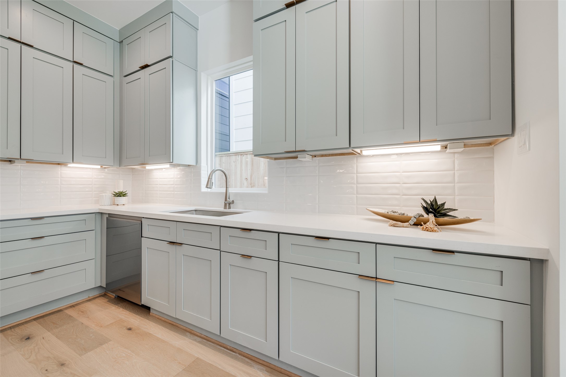 2015 Hopkins Street Houston, TX 77006 - Photo 26 of 50 a kitchen with white cabinets