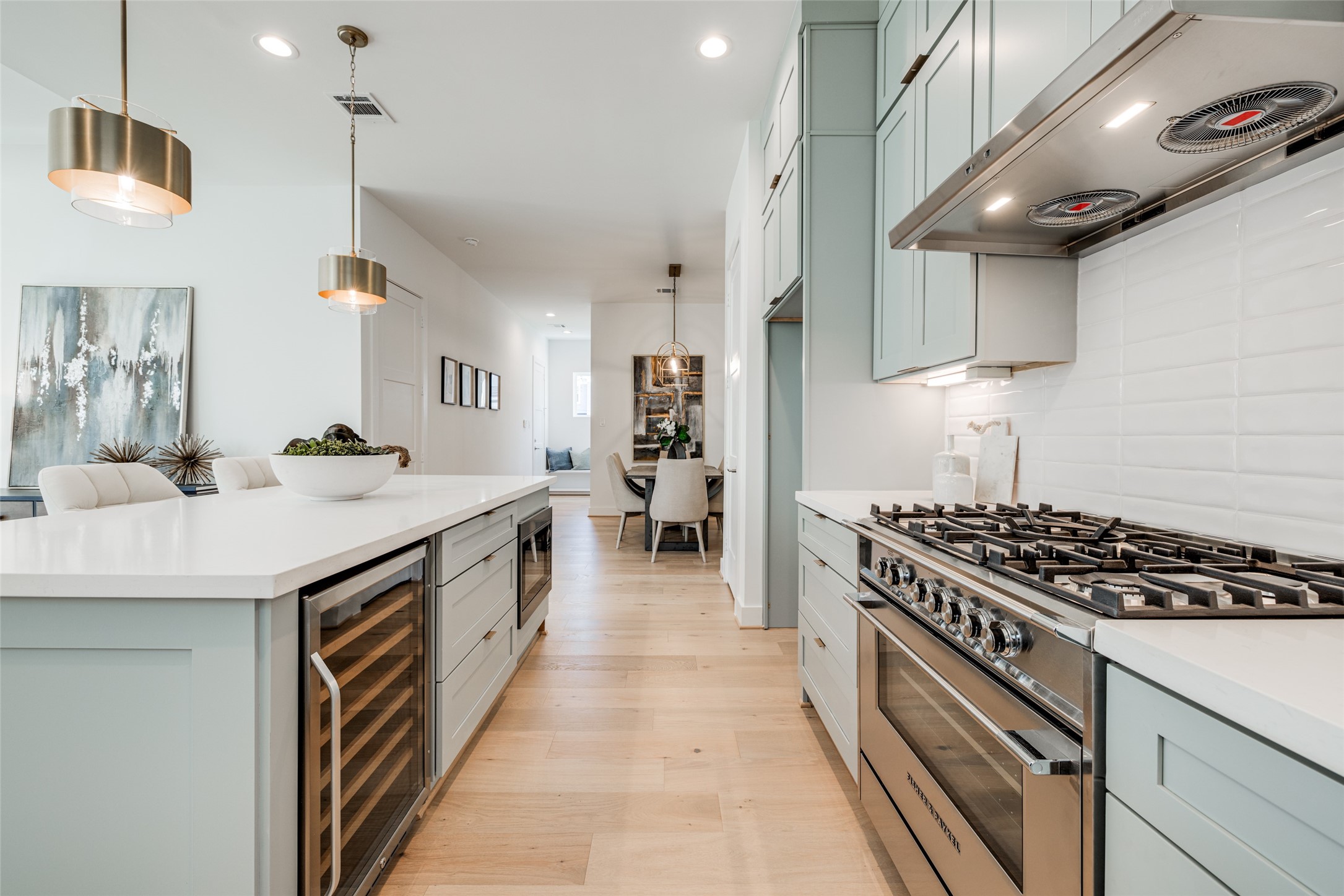 2015 Hopkins Street Houston, TX 77006 - Photo 27 of 50 a kitchen with stainless steel appliances a sink and a stove