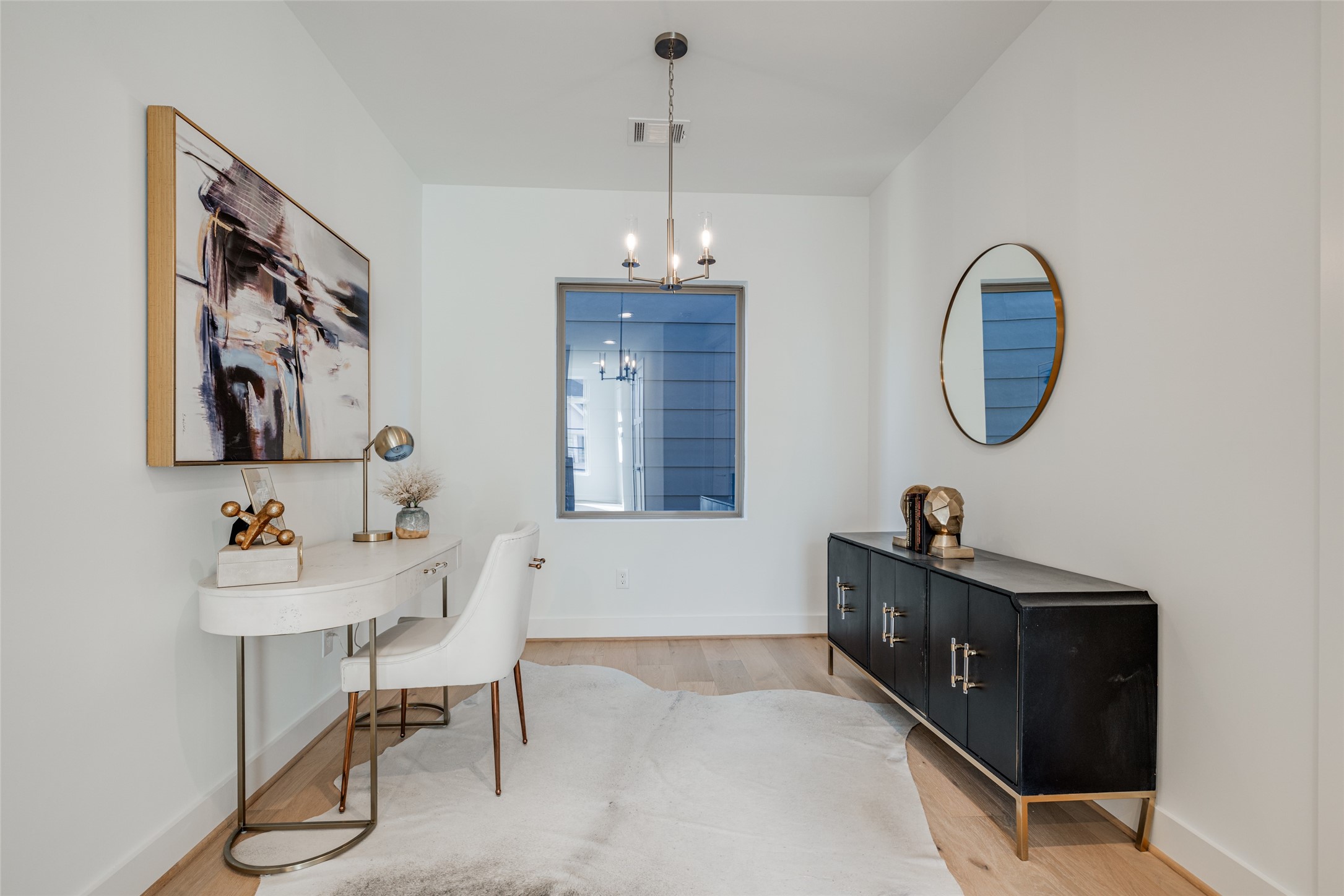 2015 Hopkins Street Houston, TX 77006 - Photo 32 of 50 a bedroom with furniture and a window