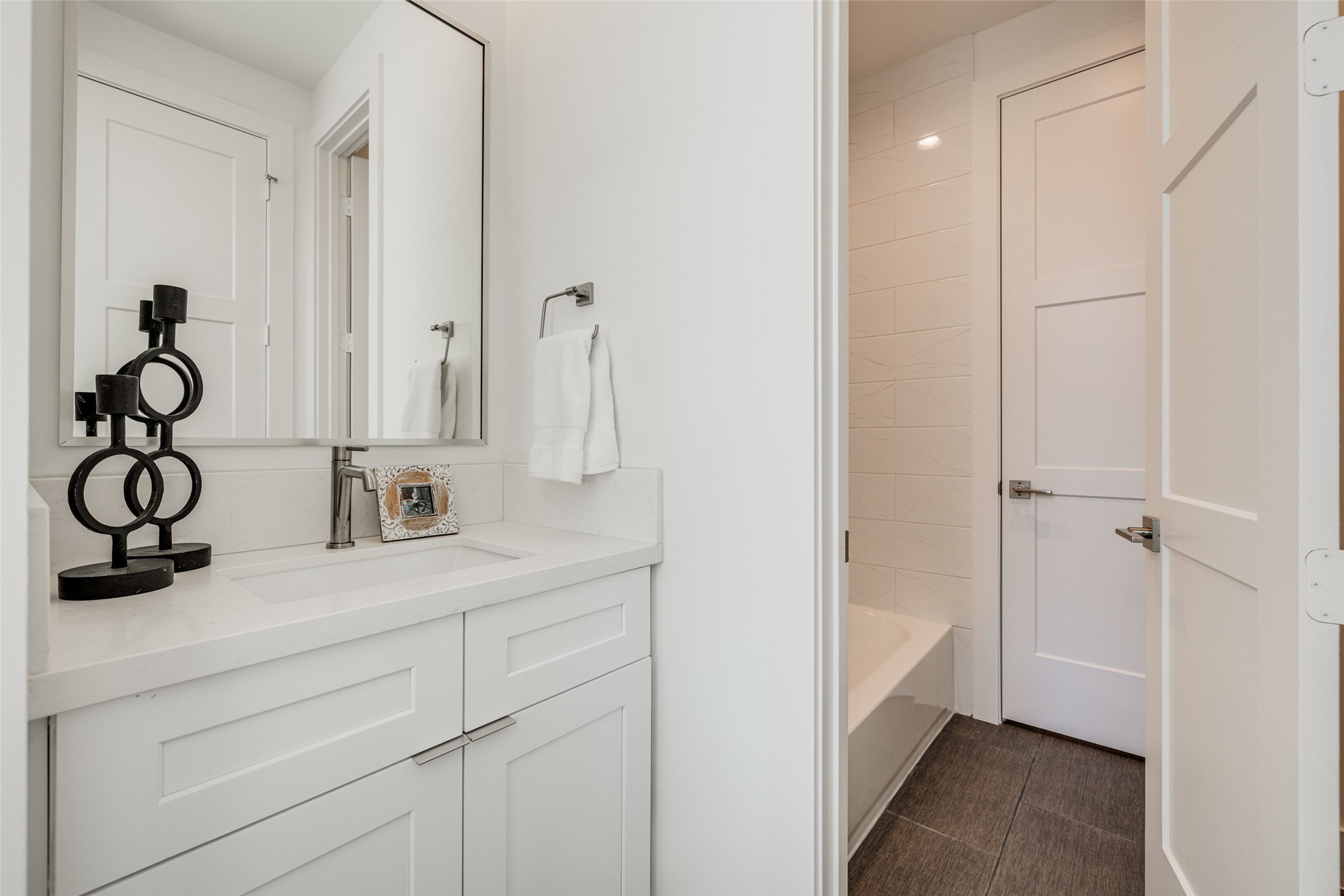 2015 Hopkins Street Houston, TX 77006 - Photo 37 of 50 a bathroom with a sink and a mirror