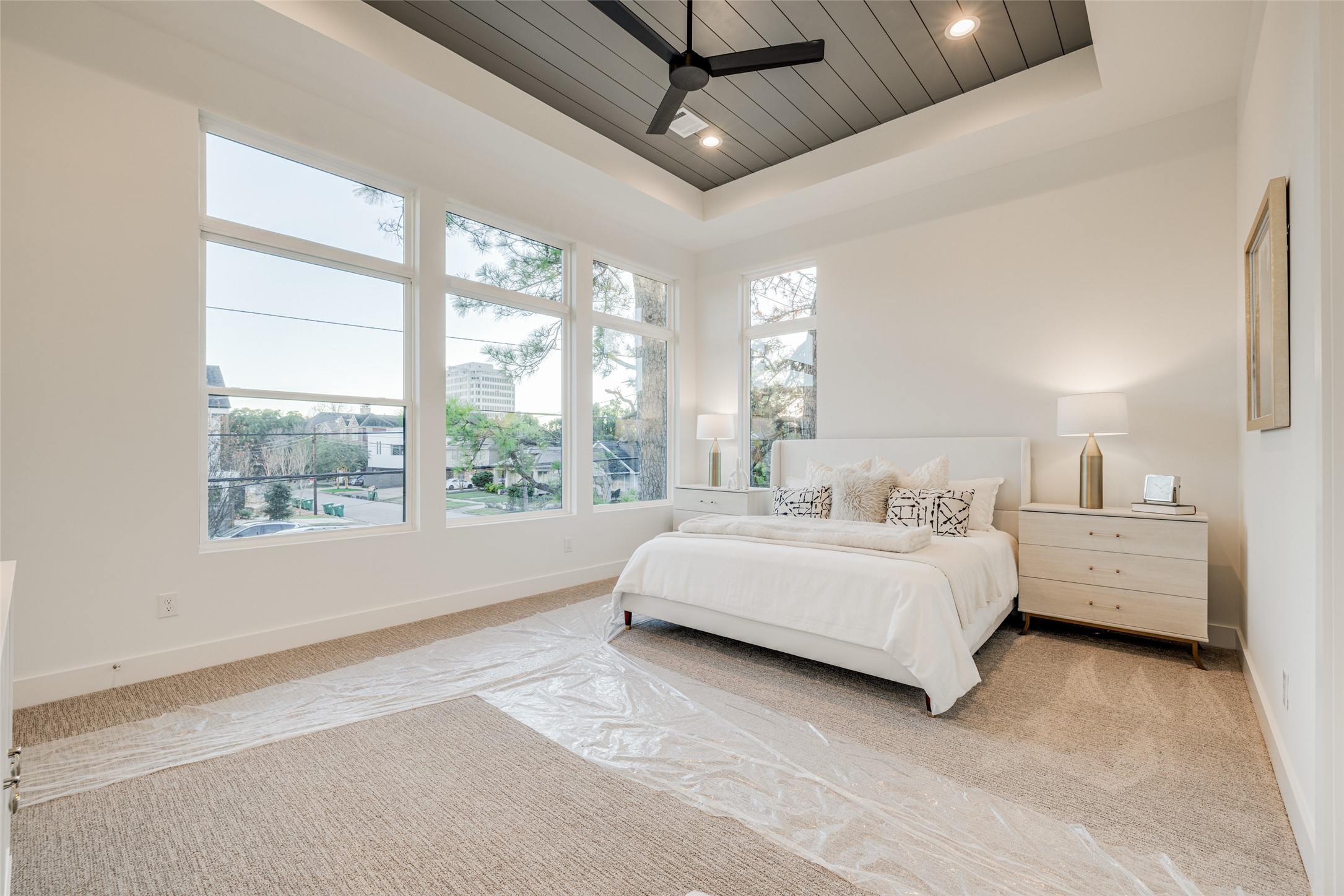 2015 Hopkins Street Houston, TX 77006 - Photo 38 of 50 a spacious bedroom with a bed and a large window