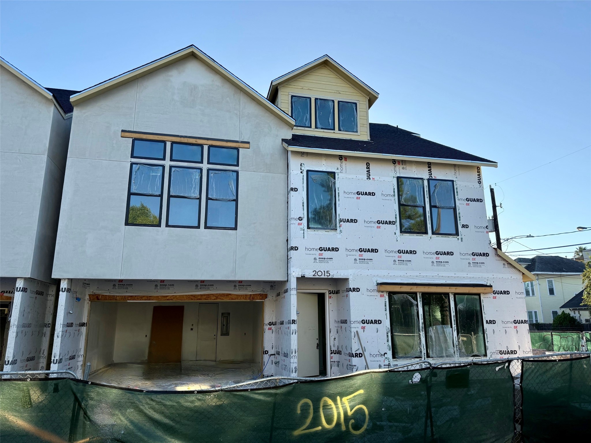 2015 Hopkins Street Houston, TX 77006 - Photo 4 of 50 a front view of a house with garden
