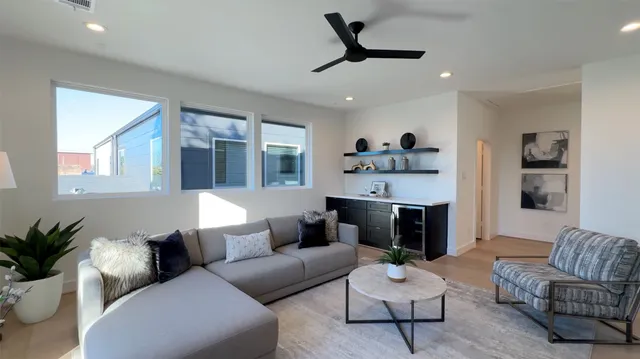 a view of a tall building from a floor to ceiling window