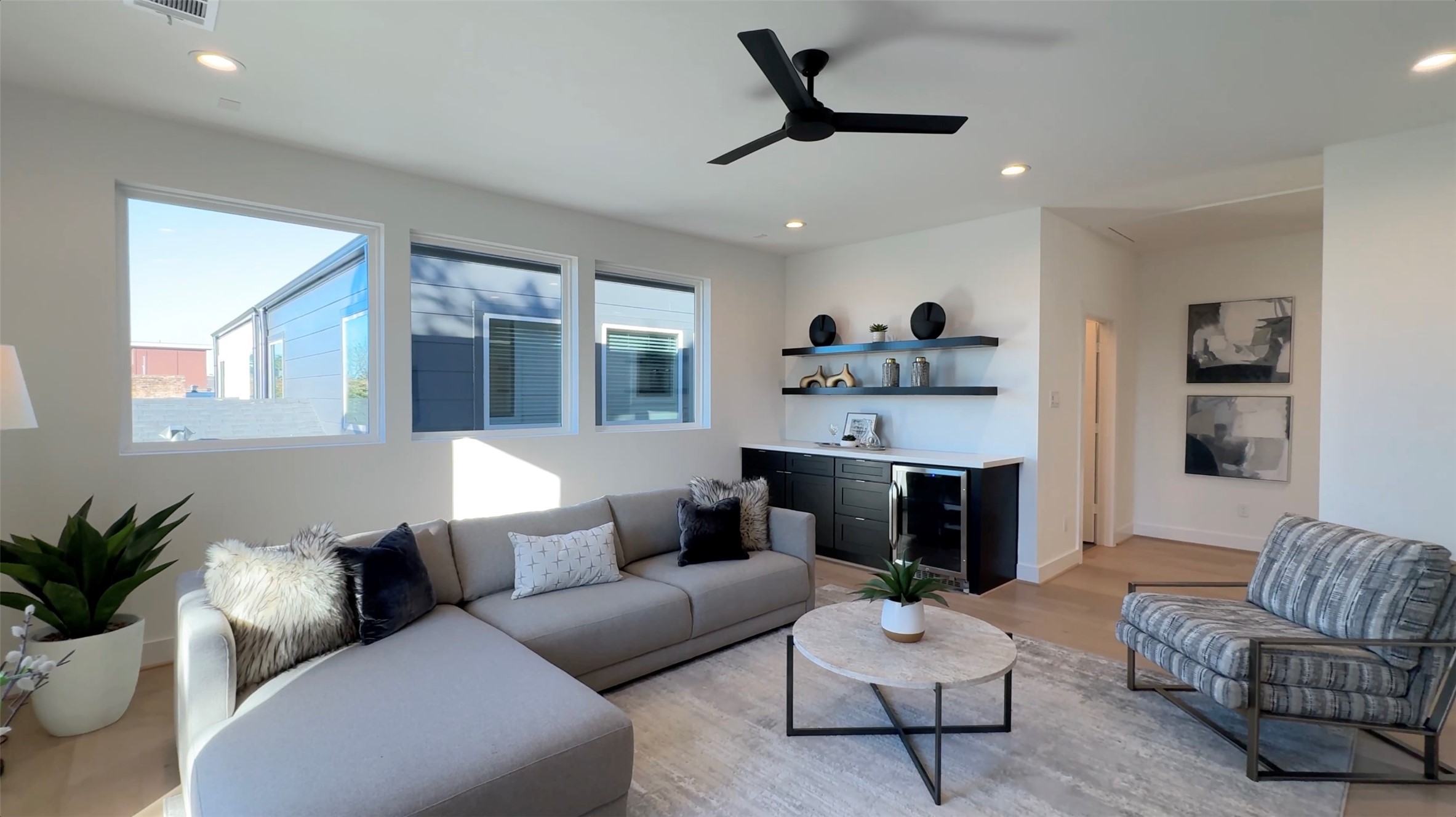2015 Hopkins Street Houston, TX 77006 - Photo 46 of 50 a living room with furniture and a large window