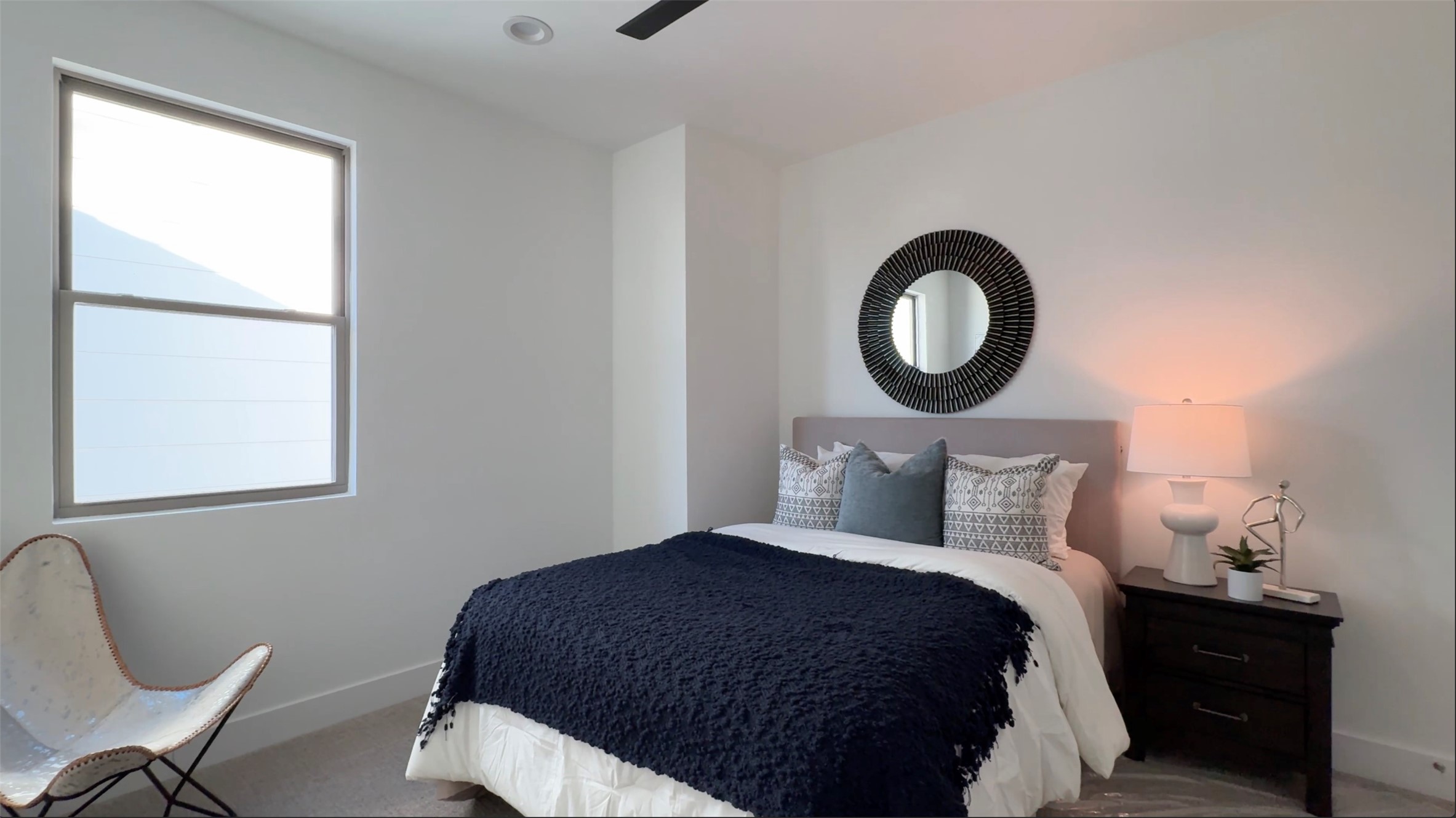 2015 Hopkins Street Houston, TX 77006 - Photo 50 of 50 a bedroom with a bed and a chair