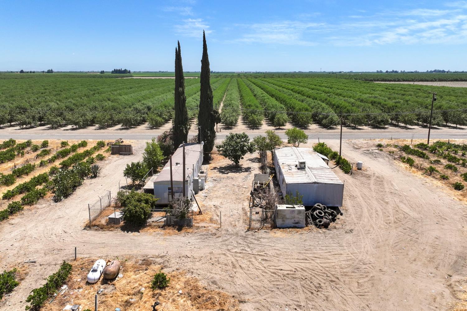 6370 Road 25 Madera, CA 93637 - Photo 4 of 9 a view of lake with residential houses with outdoor space