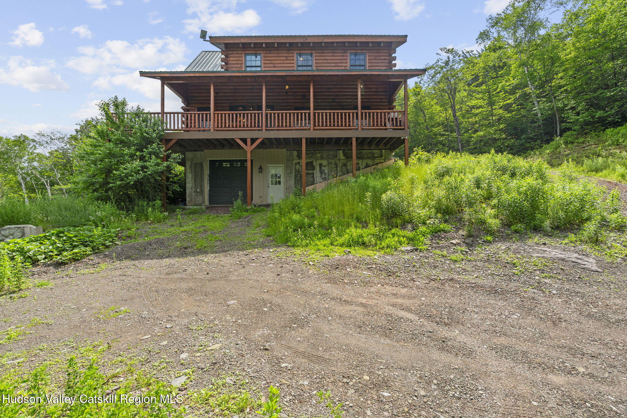 892 Durham Road Gilboa, NY 12076 - Photo 35 of 45 a front view of a house with a garden