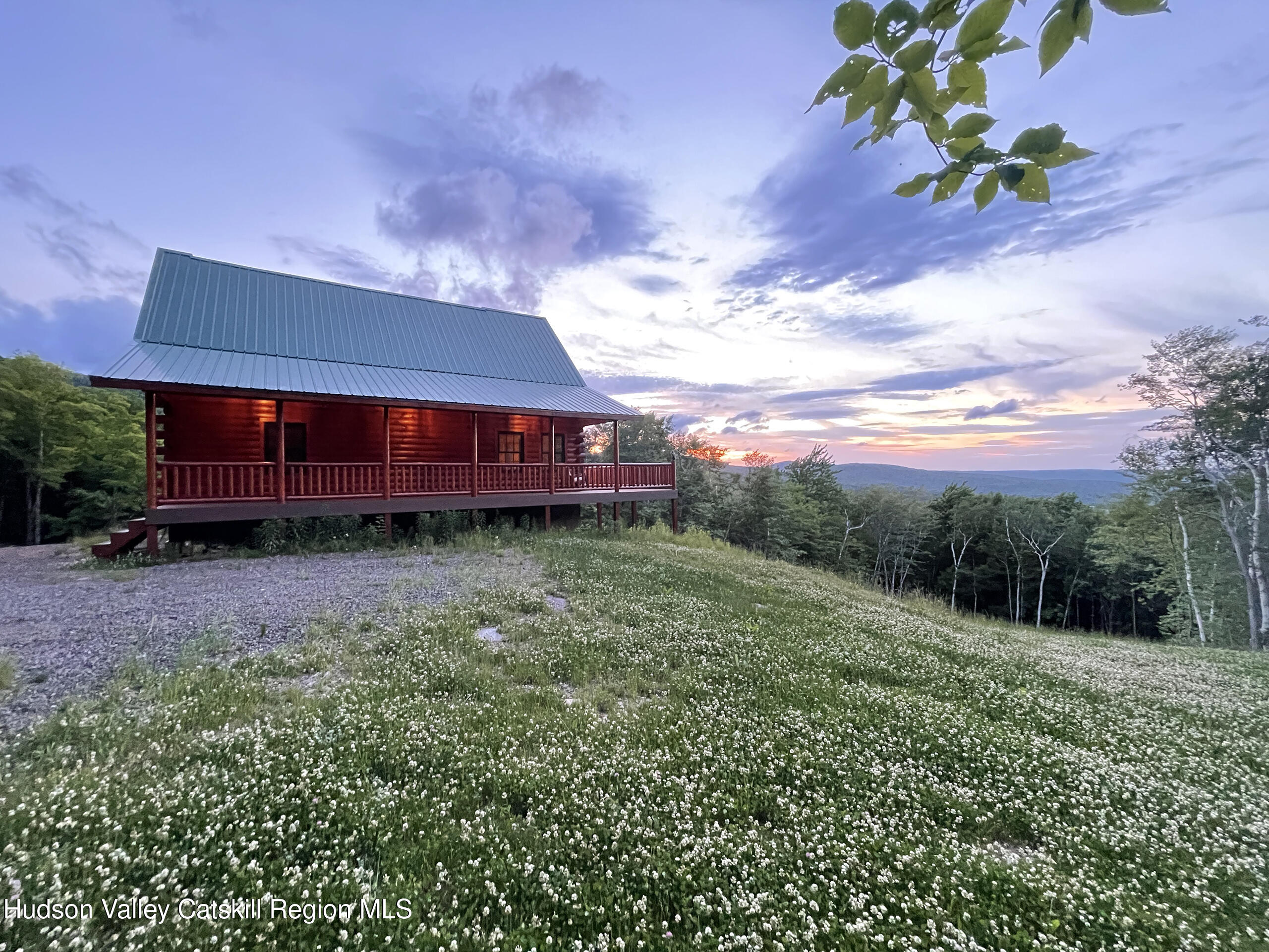 892 Durham Road Gilboa, NY 12076 - Photo 37 of 45 a view of a house with a yard and a garden
