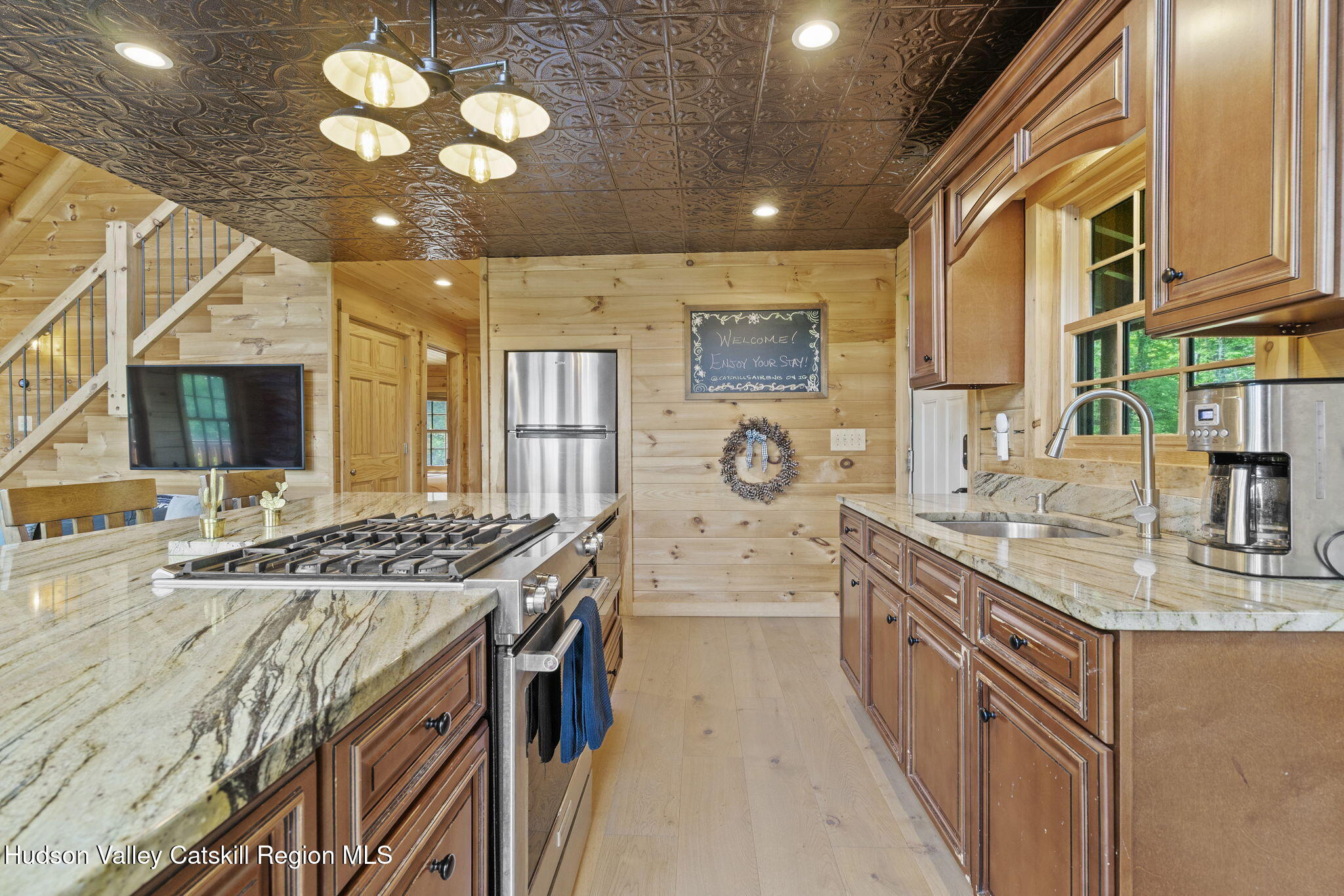 892 Durham Road Gilboa, NY 12076 - Photo 4 of 45 a kitchen with stainless steel appliances granite countertop a stove and a sink