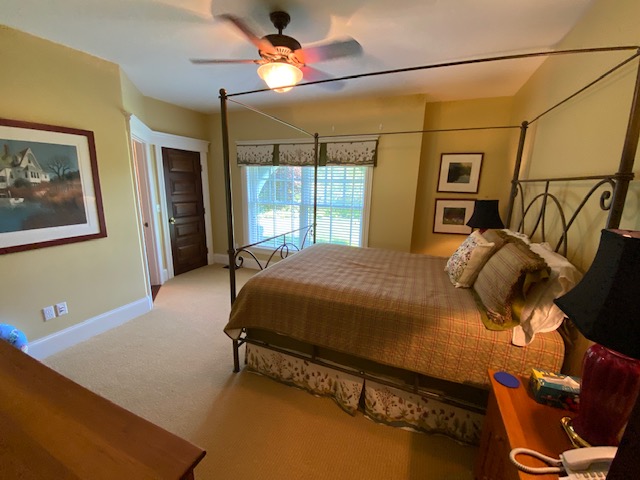 3 Katama Bay View Road Edgartown, MA 02539 - Photo 27 of 50 a bedroom with a bed and wooden floor
