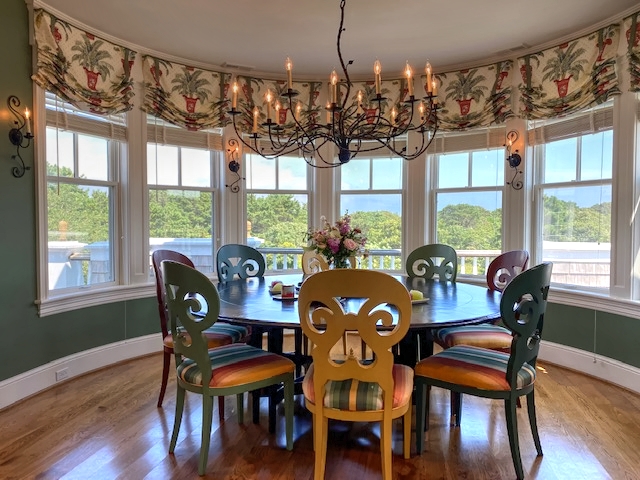 3 Katama Bay View Road Edgartown, MA 02539 - Photo 31 of 50 a view of a dining room with furniture window and wooden floor
