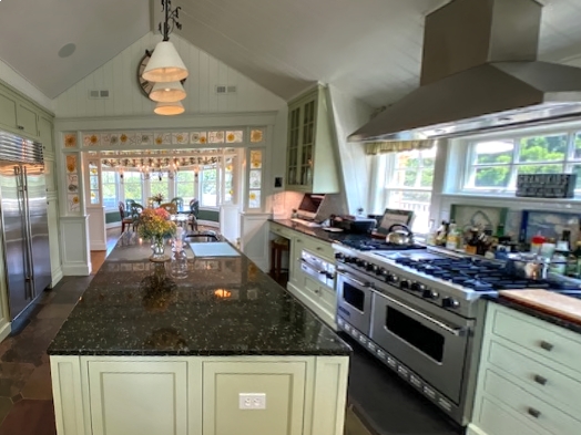 3 Katama Bay View Road Edgartown, MA 02539 - Photo 37 of 50 a large kitchen with stainless steel appliances granite countertop a stove a sink and a granite counter tops