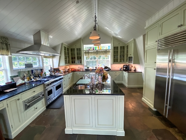 3 Katama Bay View Road Edgartown, MA 02539 - Photo 38 of 50 a kitchen with stainless steel appliances granite countertop a sink a stove and a refrigerator