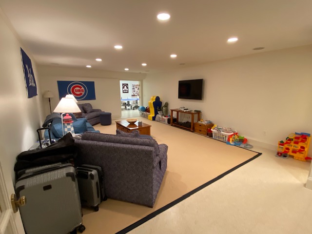 3 Katama Bay View Road Edgartown, MA 02539 - Photo 41 of 50 a living room with furniture and a flat screen tv