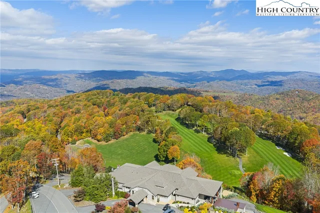 a view of an aerial view of residential houses with outdoor space