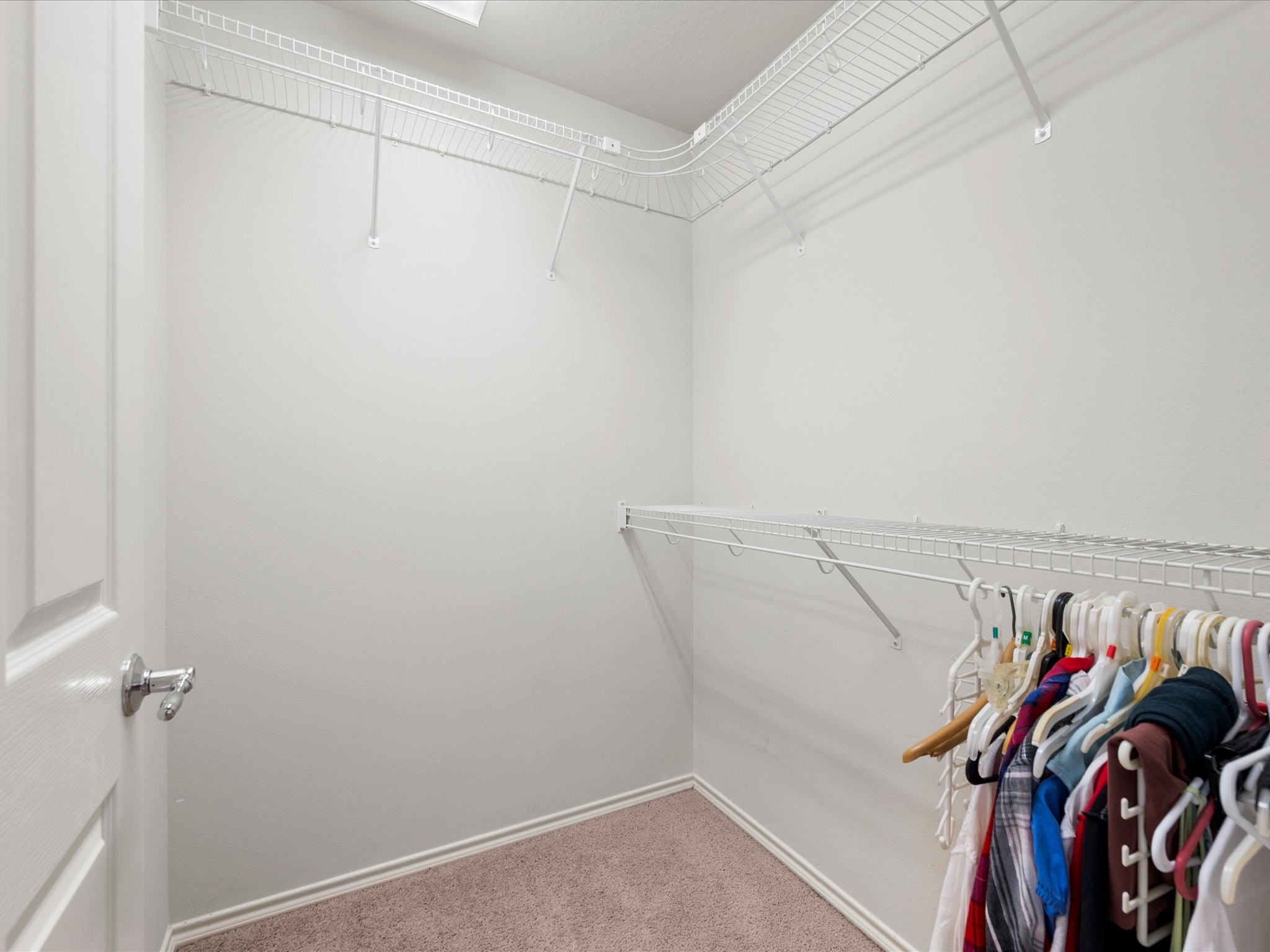 13600 Breton Ridge Street, Unit 31C Houston, TX 77070 - Photo 22 of 31 A generous walk-in closet provides exceptional storage and organization, giving you plenty of room for clothing, accessories, and more.