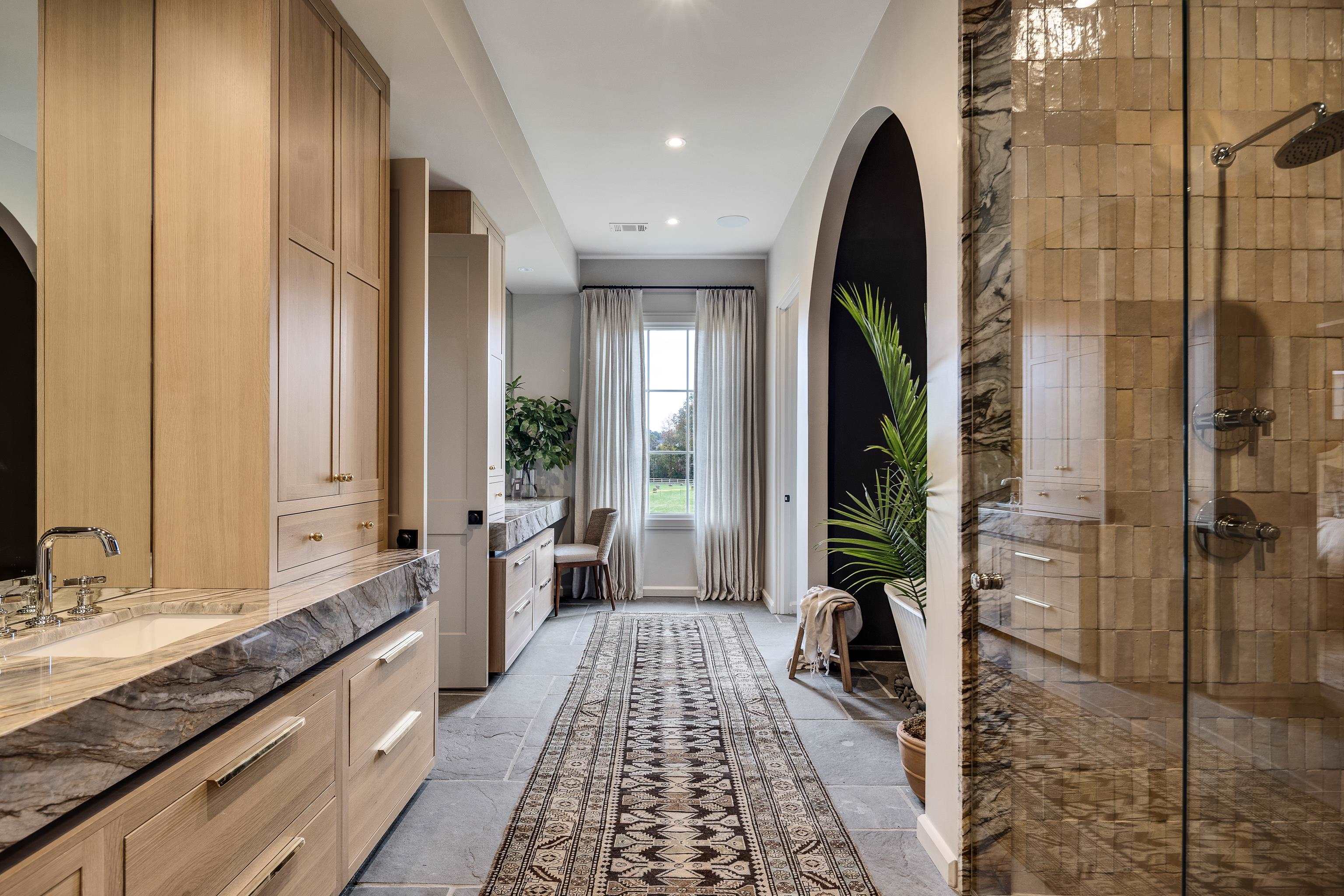 3310 Hidden Creek Loop Collierville, TN 38017 - Photo 19 of 40 a bathroom with a double vanity sink and a mirror