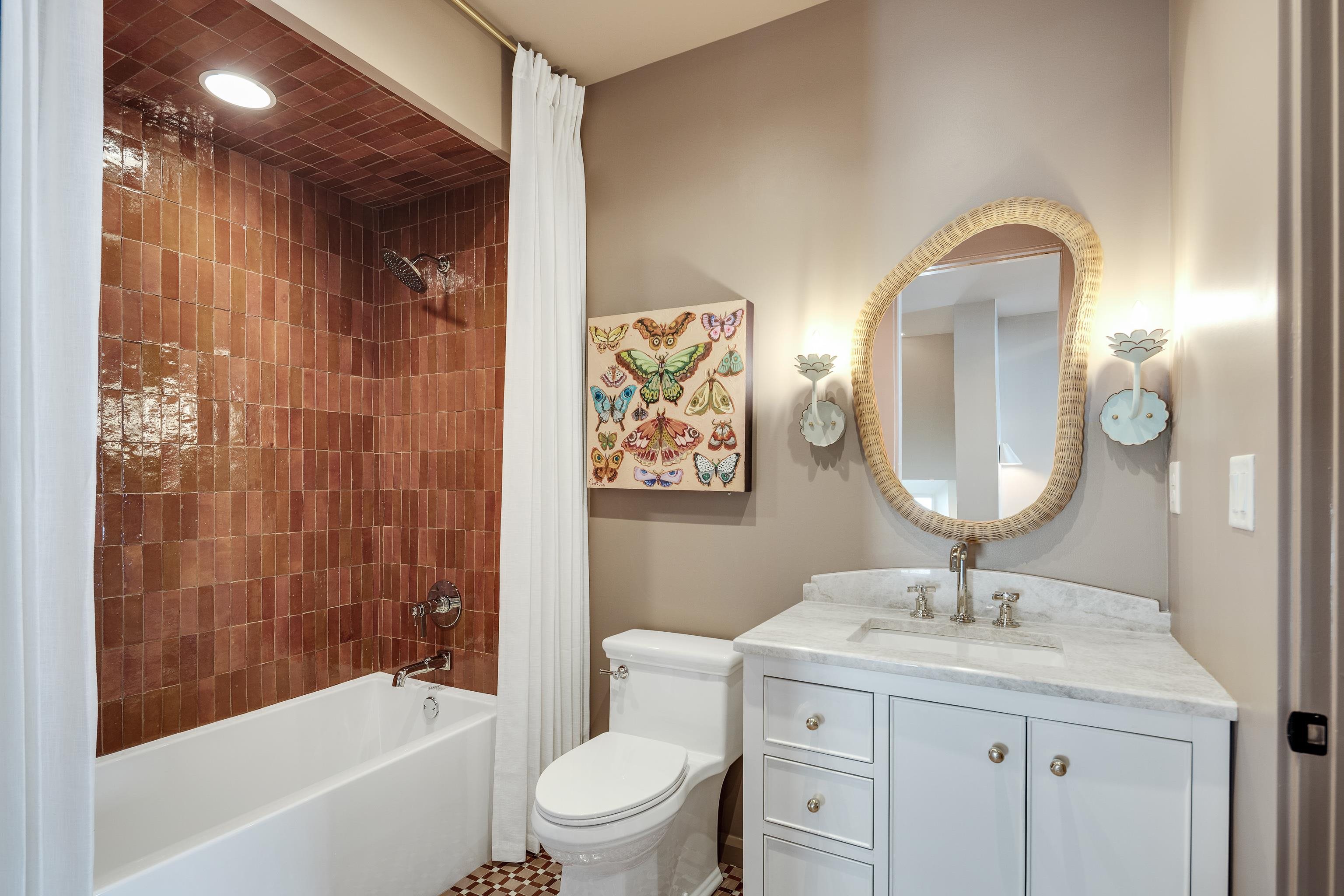 3310 Hidden Creek Loop Collierville, TN 38017 - Photo 27 of 40 a bathroom with a granite countertop sink a toilet and a mirror