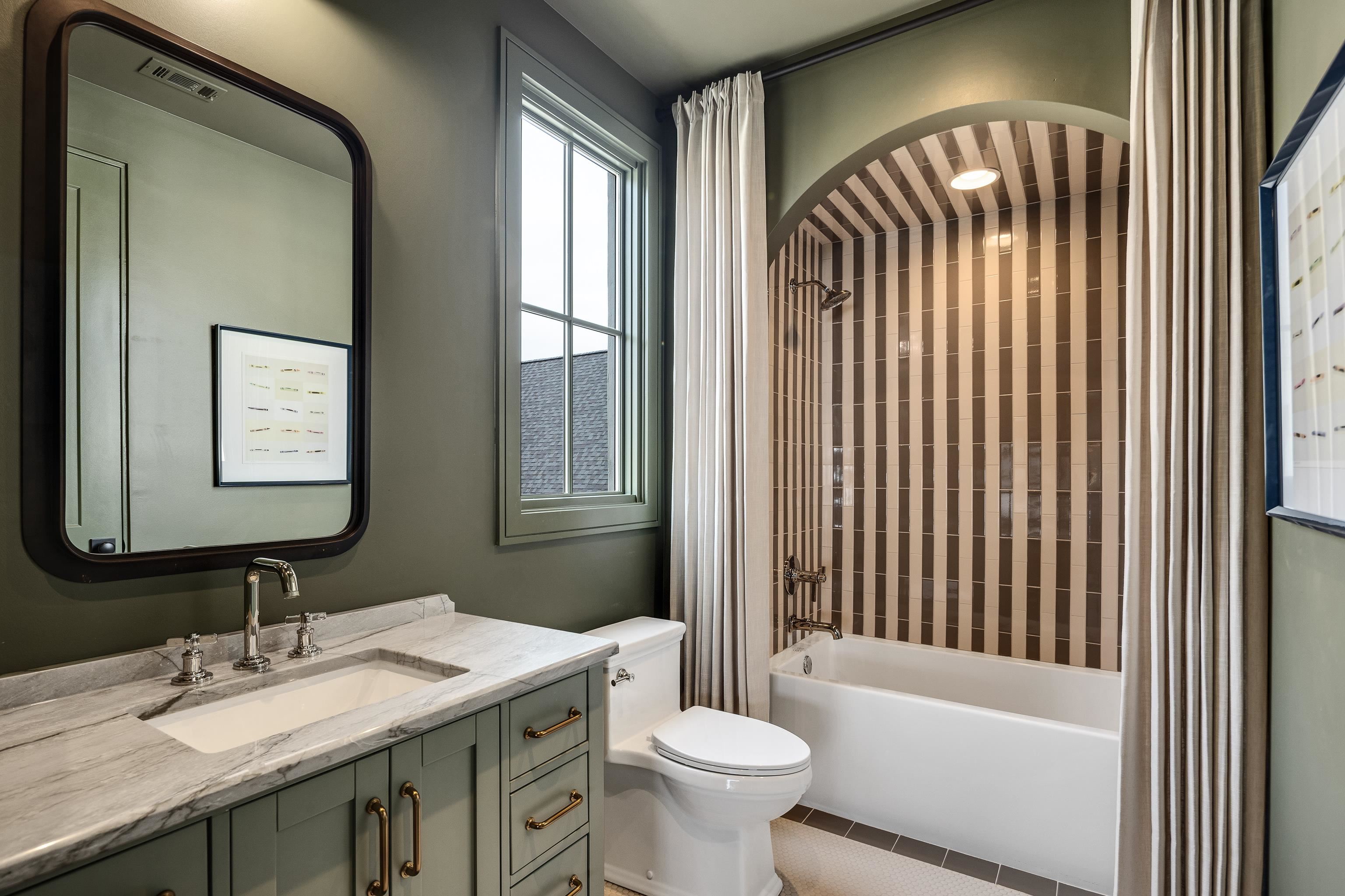 3310 Hidden Creek Loop Collierville, TN 38017 - Photo 29 of 40 a bathroom with a sink and a mirror