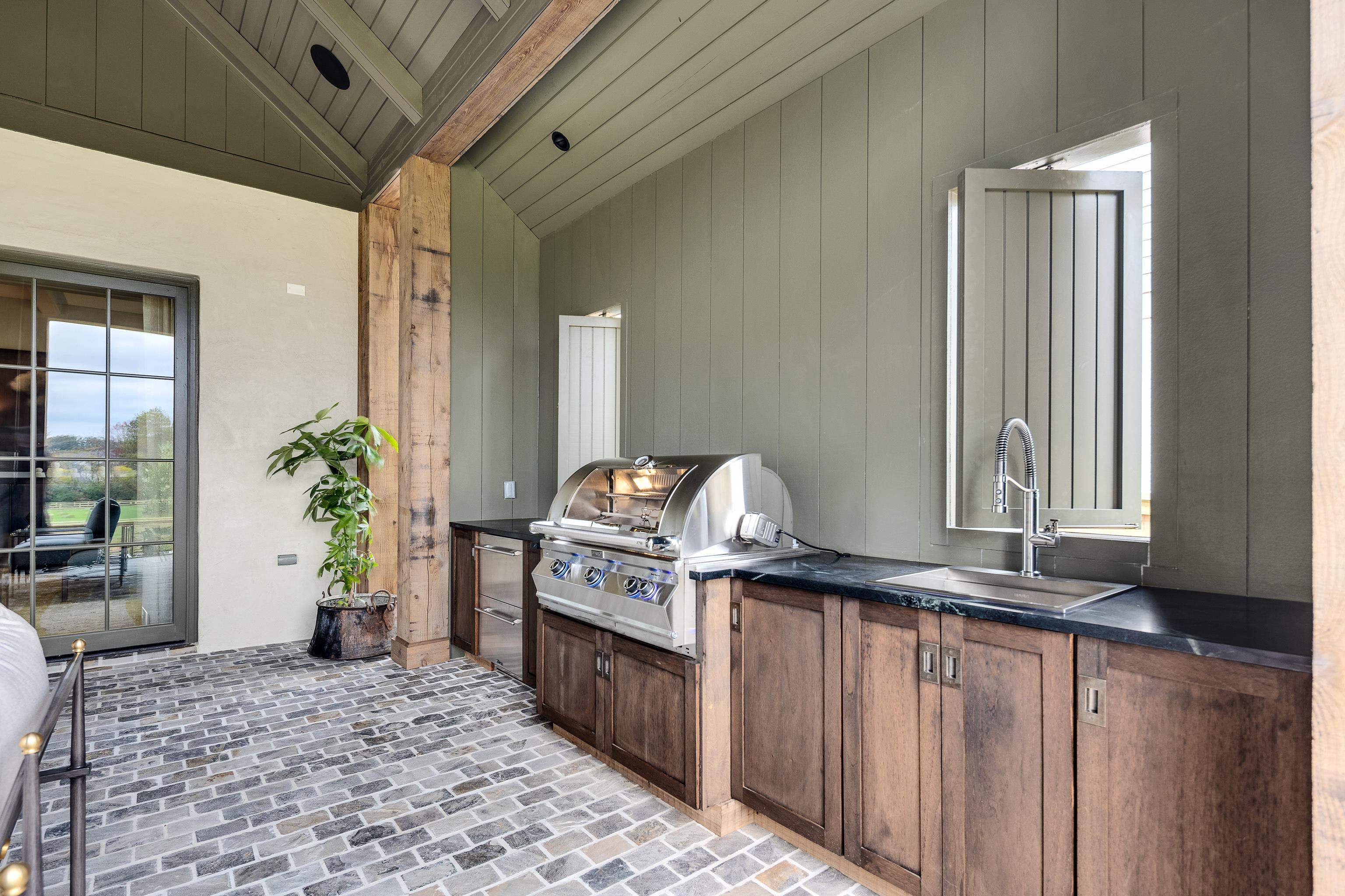 3310 Hidden Creek Loop Collierville, TN 38017 - Photo 35 of 40 View of patio / terrace featuring area for grilling and a sink