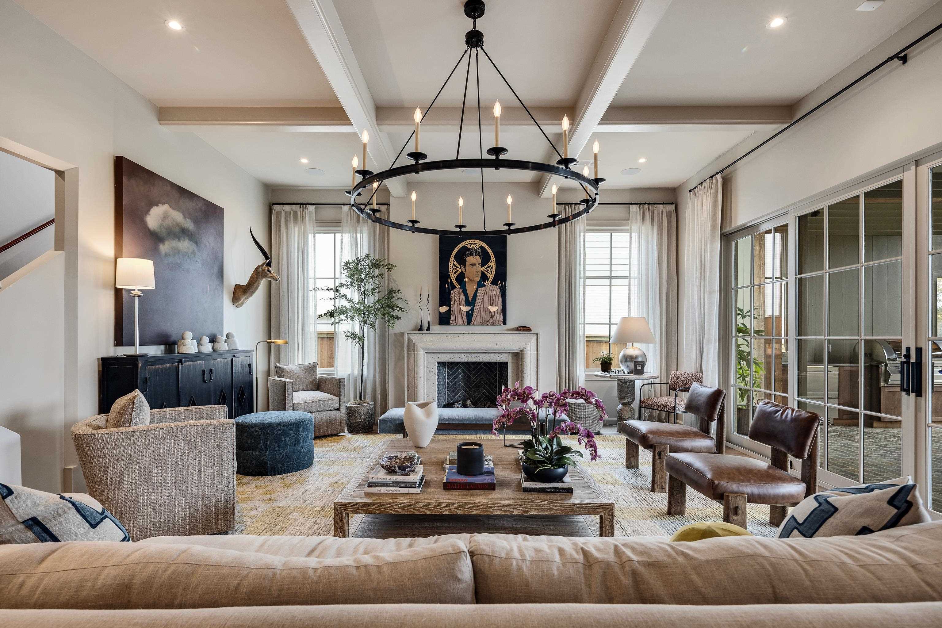 3310 Hidden Creek Loop Collierville, TN 38017 - Photo 6 of 40 a living room with furniture a fireplace and a chandelier