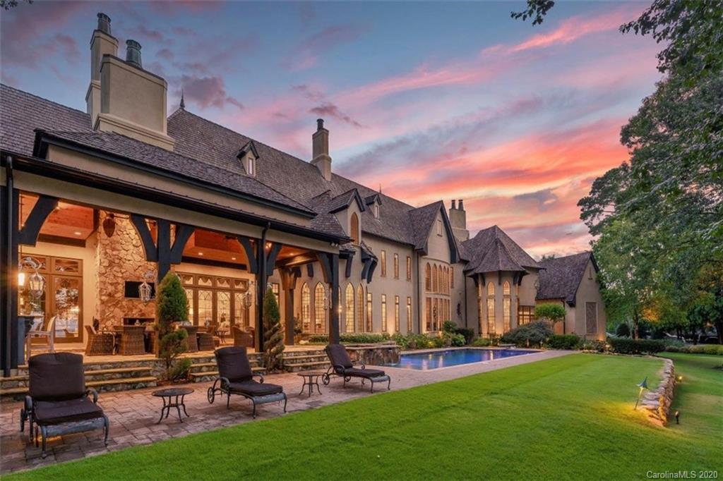 16505 Jetton Road Cornelius, NC 28031 - Photo 2 of 48 a front view of a house with garden and sitting area