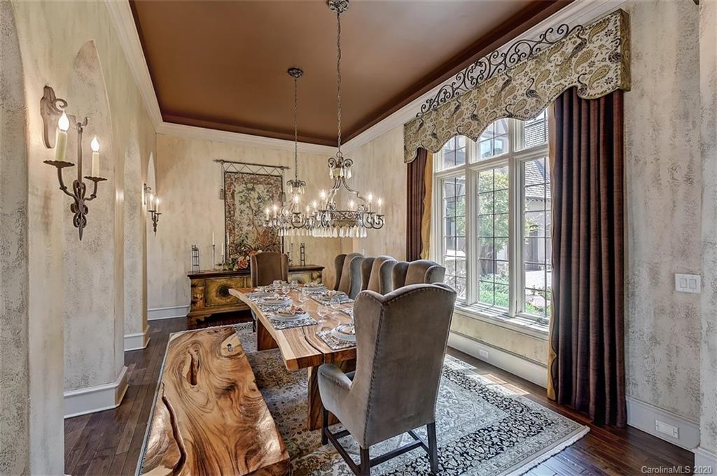 16505 Jetton Road Cornelius, NC 28031 - Photo 13 of 48 a view of a dining room with furniture window and wooden floor