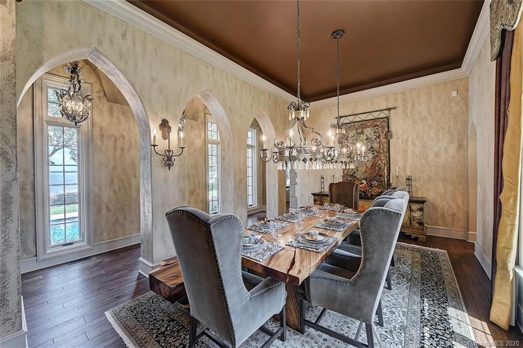 16505 Jetton Road Cornelius, NC 28031 - Photo 14 of 48 a view of a dining room with furniture window and wooden floor