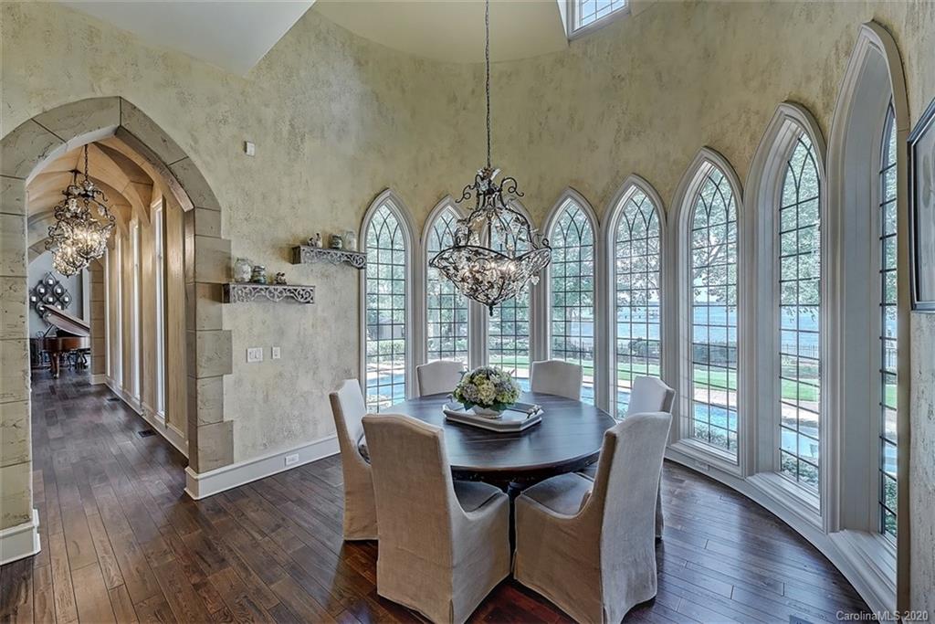 16505 Jetton Road Cornelius, NC 28031 - Photo 19 of 48 a view of a dining room with furniture window and wooden floor