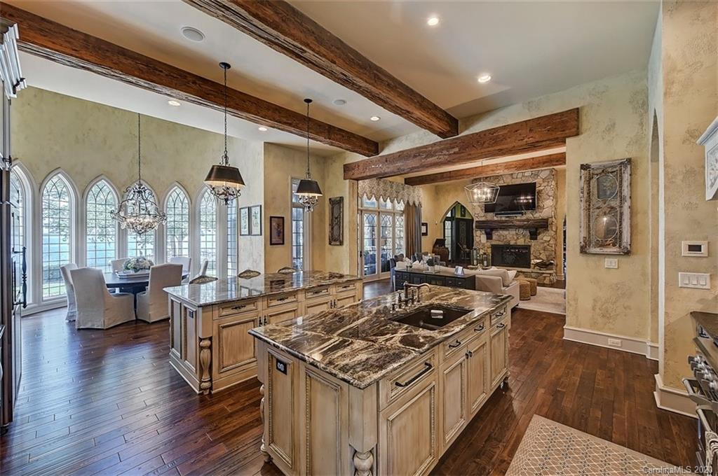 16505 Jetton Road Cornelius, NC 28031 - Photo 3 of 48 a kitchen with a stove and wooden floor