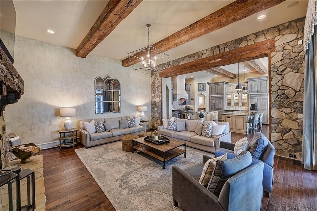 16505 Jetton Road Cornelius, NC 28031 - Photo 21 of 48 a living room with furniture wooden floor and a table