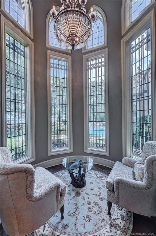 16505 Jetton Road Cornelius, NC 28031 - Photo 27 of 48 a bedroom with furniture and a large window