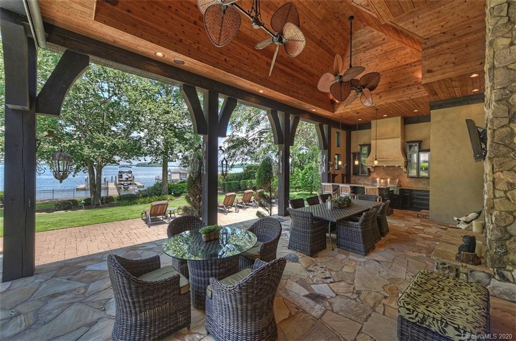 16505 Jetton Road Cornelius, NC 28031 - Photo 33 of 48 a view of a patio with couches chairs and a table and chairs
