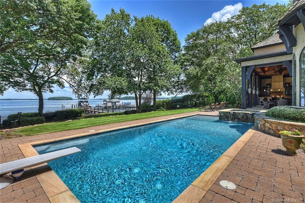 16505 Jetton Road Cornelius, NC 28031 - Photo 5 of 48 a view of a house with swimming pool and sitting area