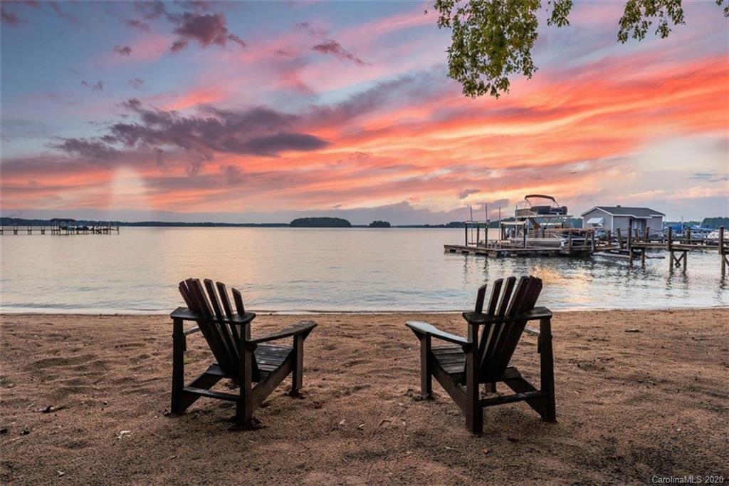 16505 Jetton Road Cornelius, NC 28031 - Photo 6 of 48 a view of a lake with table and chairs