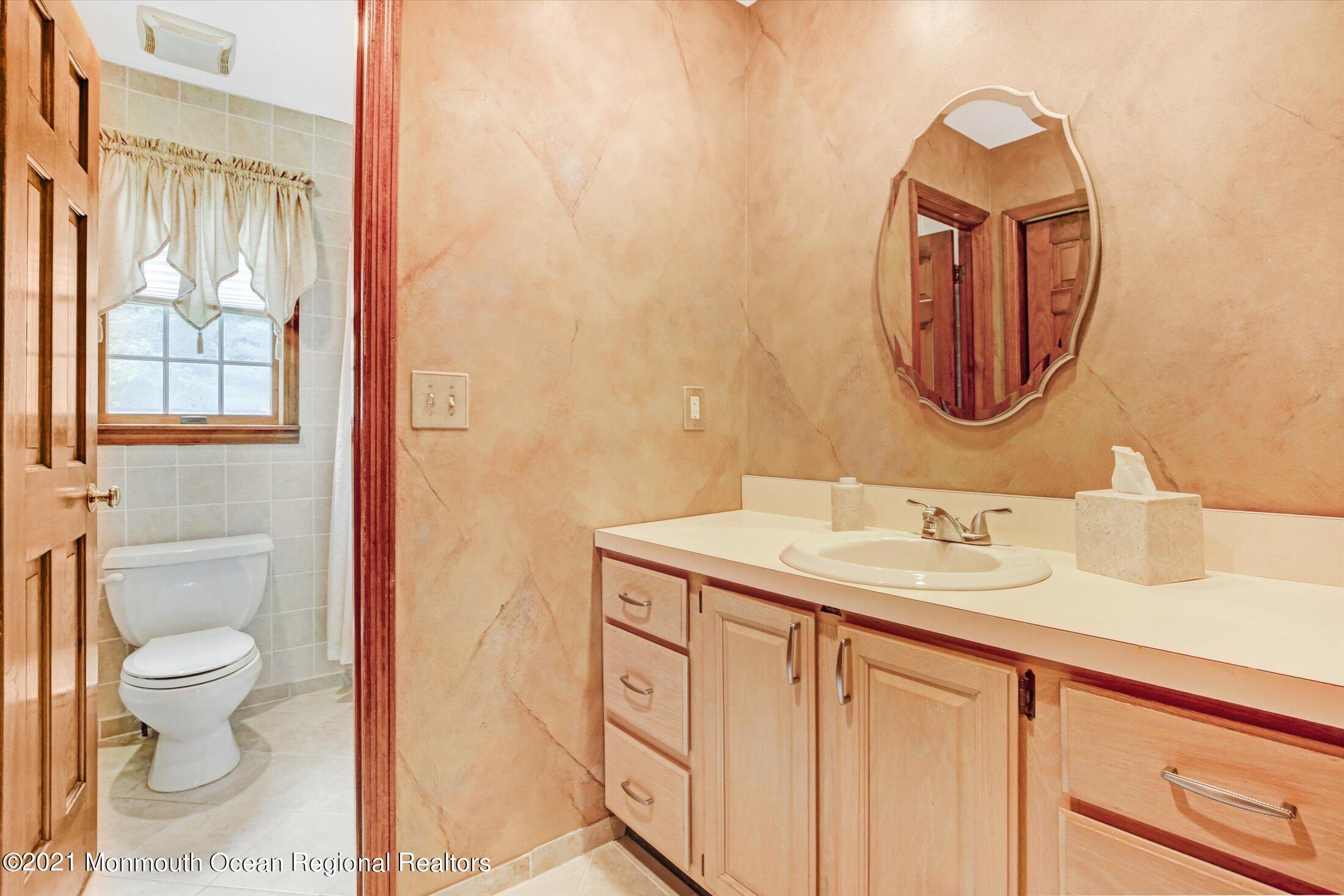 167 Millhurst Road Manalapan, NJ 07726 - Photo 14 of 23 27-Full Bathroom