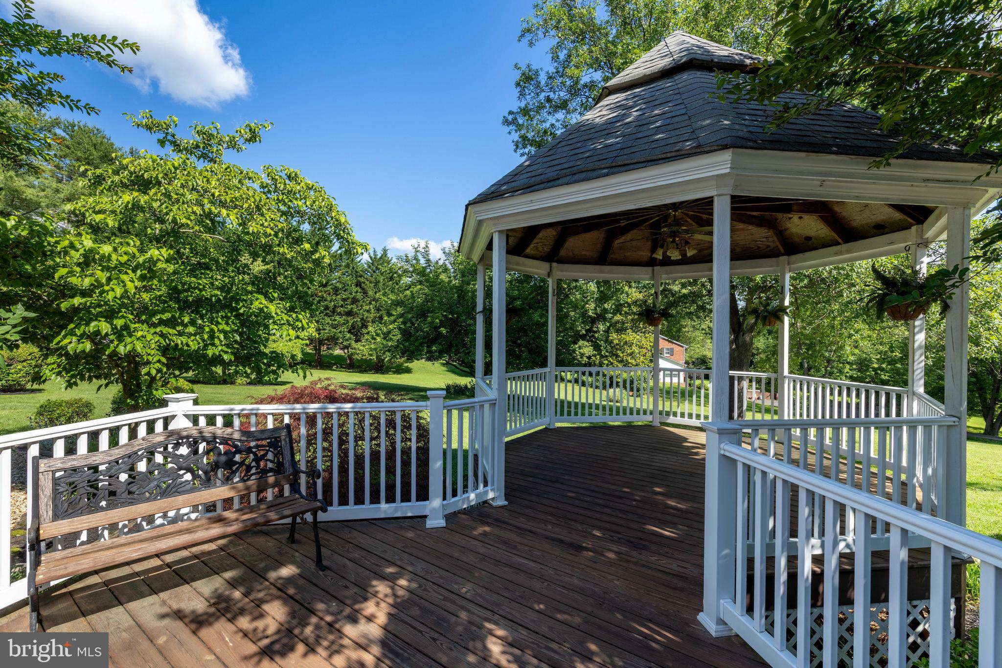 650 Yowell Drive Culpeper, VA 22701 - Photo 12 of 65 a view of a wooden deck with a yard