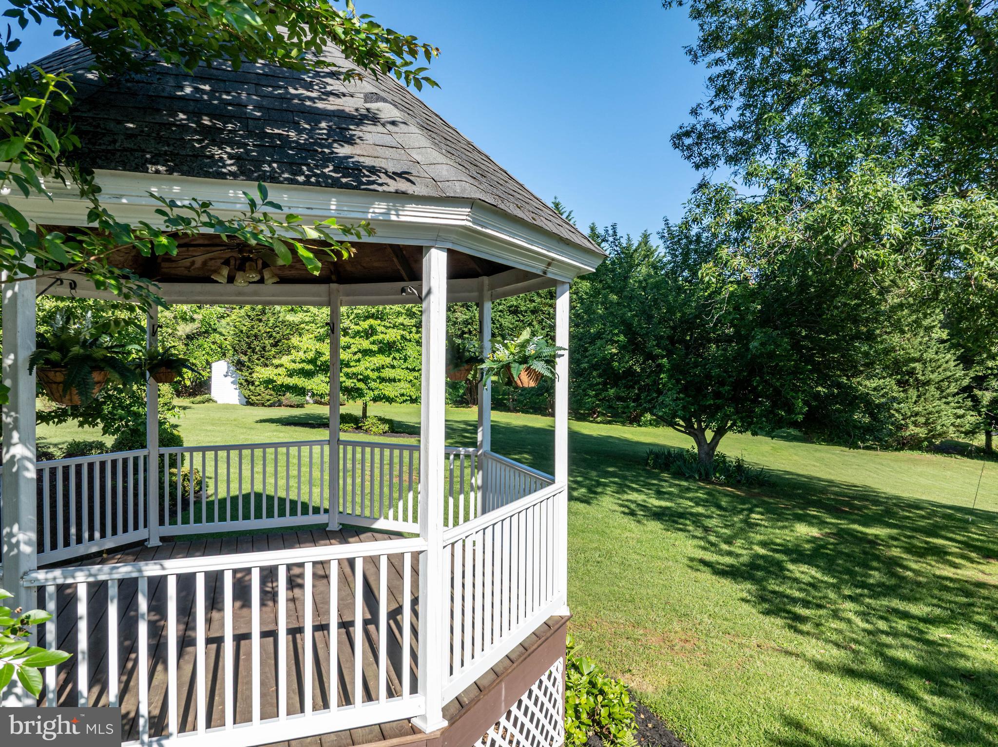 650 Yowell Drive Culpeper, VA 22701 - Photo 14 of 65 a view of a deck with a large window and wooden fence