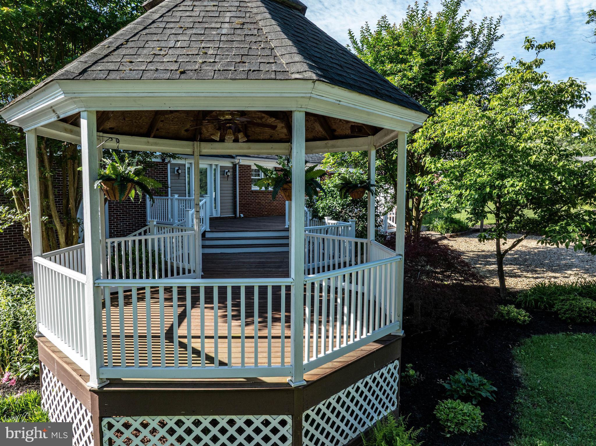 650 Yowell Drive Culpeper, VA 22701 - Photo 15 of 65 a view of a patio with a table and chairs