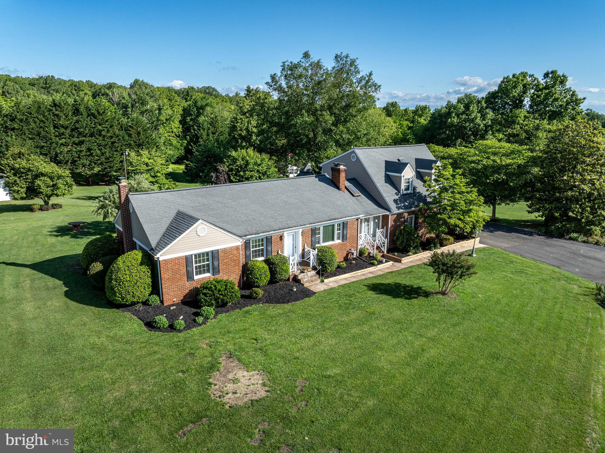 650 Yowell Drive Culpeper, VA 22701 - Photo 2 of 65 a view of a house with a yard