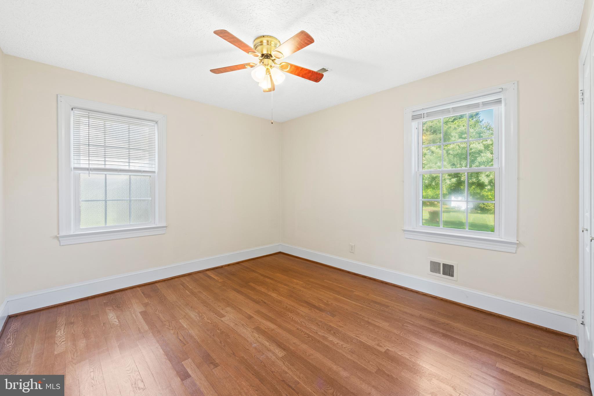 650 Yowell Drive Culpeper, VA 22701 - Photo 36 of 65 wooden floor in an empty room with a window