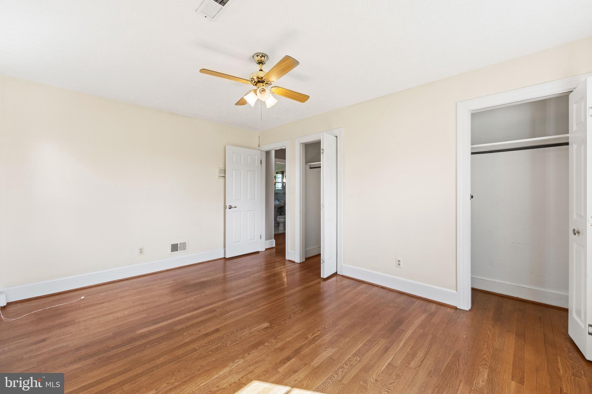 650 Yowell Drive Culpeper, VA 22701 - Photo 39 of 65 wooden floor in an empty room with a window