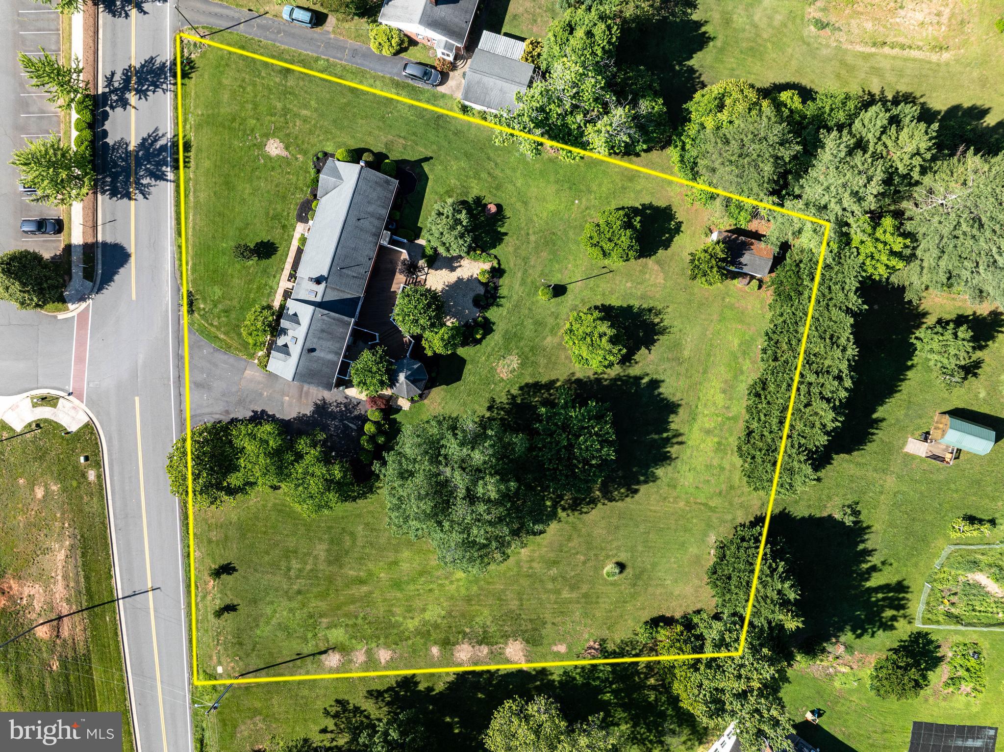 650 Yowell Drive Culpeper, VA 22701 - Photo 61 of 65 an aerial view of a residential houses with outdoor space and trees all around